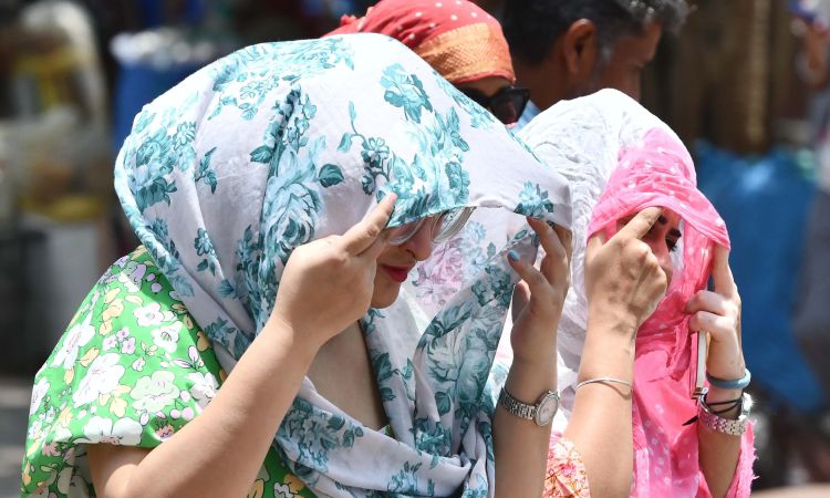 گرمی کے خلاف غیر رسمی کارکن کی بیمہ کرنا